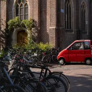 Red Cars in The Tanker: Photography Discovers Symbolism